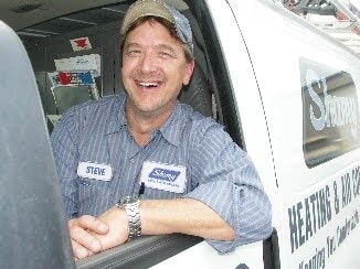 A friendly Shamy Heating & Air Conditioning technician - we’re happy to help keep your home comfortable. Contact us today!