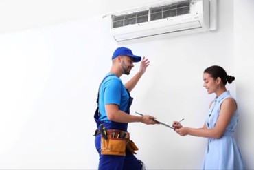 A technician working on a ductless system in Ottawa Hills. Trust Shamy Heating & Air Conditioning to provide all the heating and cooling services you need.