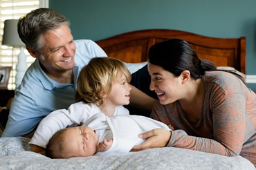 A family in a Ottawa Hills home. Call Shamy Heating & Air Conditioning and work with our HVAC experts in Ottawa Hills and surrounding areas.